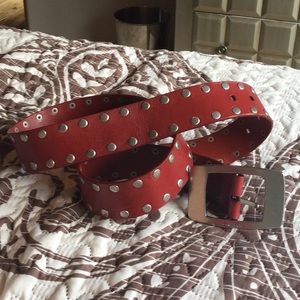 CK red leather studded belt
